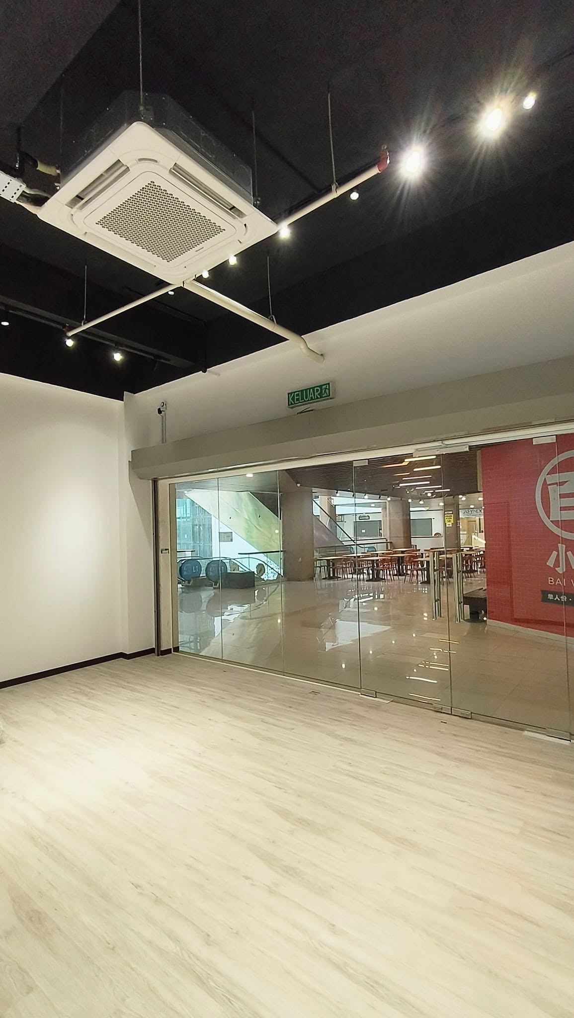 Glass frontage with vinyl timber flooring