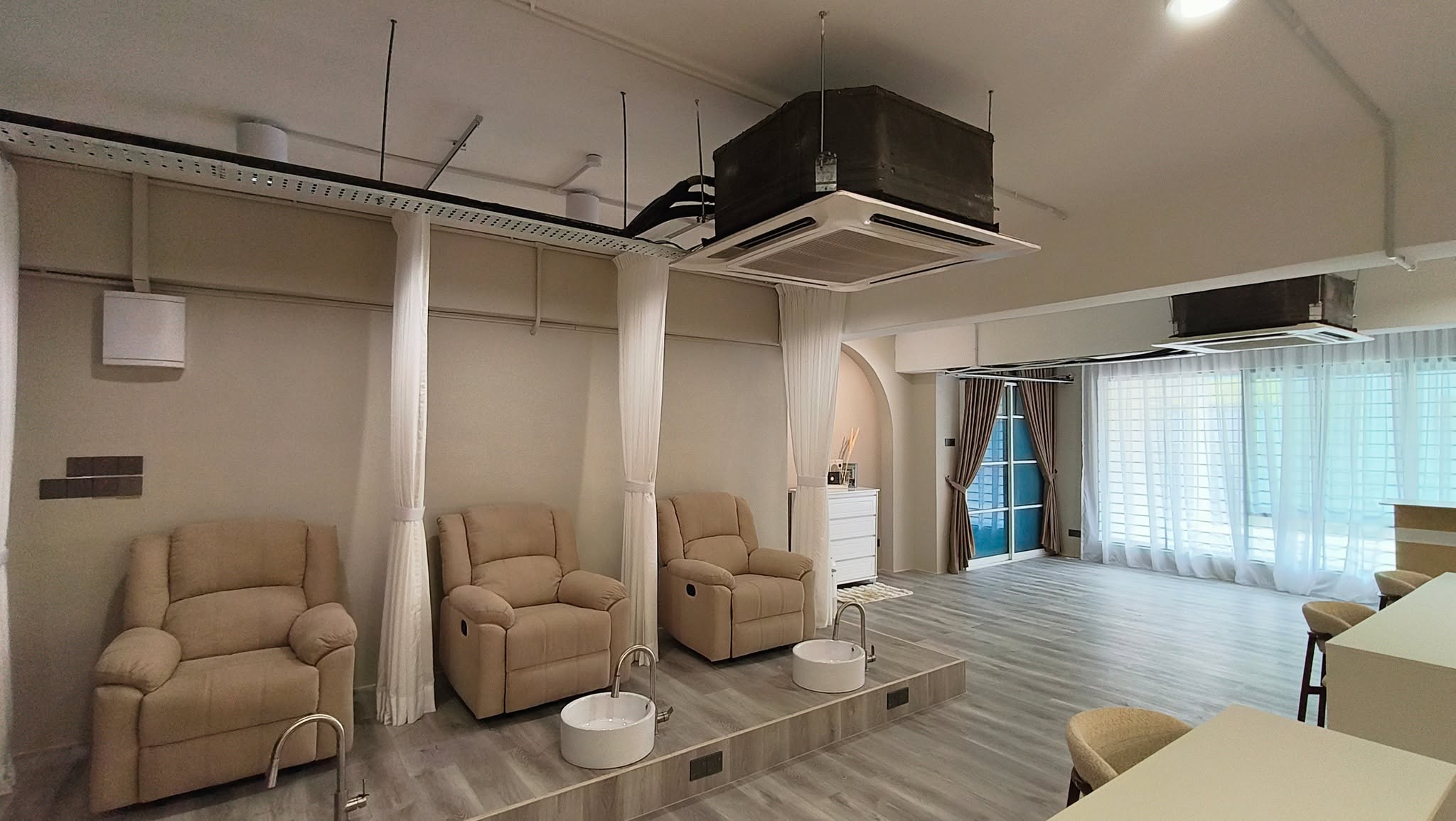 Completed beauty salon renovation — pedicure lounge area